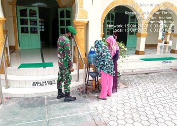 Personel Babinsa Kodim 0208/Asahan Serukan Himbauan Penanganan Pencegahan Covid-19 Kepada Masyarakat