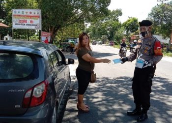 Gelar Operasi Yustisi Covid-19 Tahun 2020 Serentak, Polres Simalungun Bagikan 4000 Masker