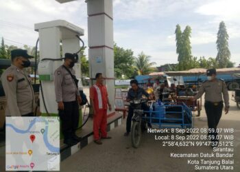 Personil Polres Tanjungbalai Laksanakan Pengamanan dan Pengaturan Lalin di SPBU Tuah Anugrah Abadi