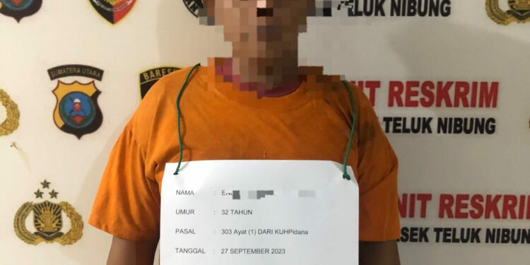 Polsek Teluk Nibung Polres Tanjungbalai mengamankan EBM Alias E (32) warga Kelurahan Perjuangan atas tindak pidana Perjudian