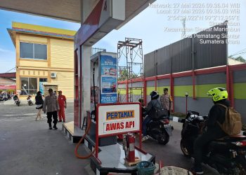 Pastikan Distribusi BBM Aman dan Lancar, Bhabinkamtibmas Siantar Marihat Lakukan Monitoring SPBU