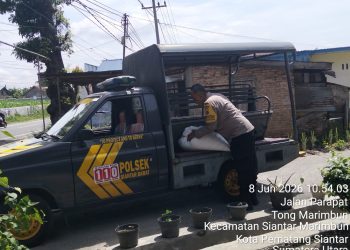 Dukung Ketahanan Pangan, Polsek Siantar Barat Kawal Penjualan Jagung Petani Binaan ke Bulog