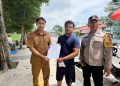 Sambangi PKL di Jalan Gereja, Bhabinkamtibmas Polsek Siantar Selatan Edukasi Kamtibmas dan Sosialisasikan Call Center 110