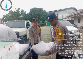 2,5 Ton Jagung Petani Diserap Bulog, Bhabinkamtibmas Siantar Martoba Turun Kawal Penjualan