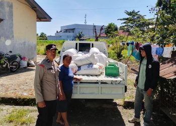 Polsek Siantar Marihat Dampingi Petani Binaan Jual 200 Kg Jagung ke Bulog