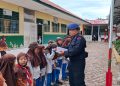 210 Nasi Kotak dan 405 Santunan Dibagikan, Brimob Batalyon C Pelopor Tebar Kebahagiaan di Sipirok