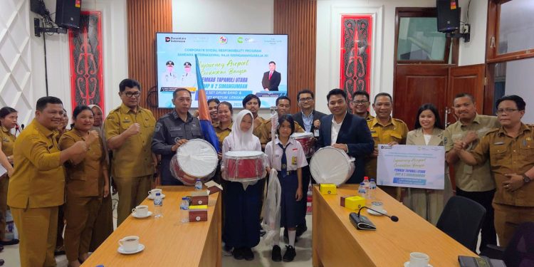 Bupati Tapanuli Utara Sambut Baik Bantuan Alat Marching Band dari PT Angkasa Pura Indonesia untuk SMP Negeri 2 Simangumban